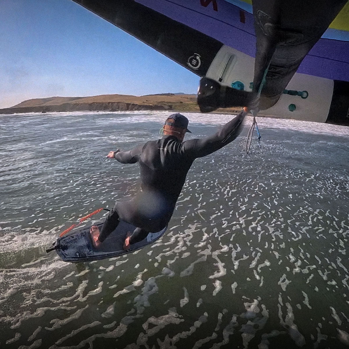 Person wingfoiling the California coast